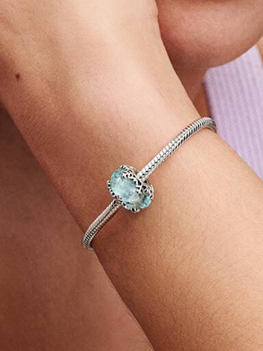 Charm Floco de Neve Azul Inverno em Vidro Murano