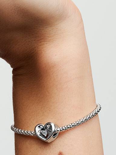 Open heart sterling silver charm with clear cubic zirconia