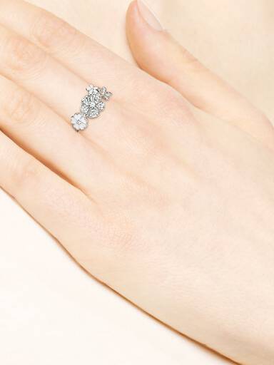 Floral silver ring with clear cubic zirconia and white enamel