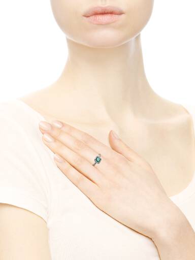 Silver ring with green and clear cubic zirconia