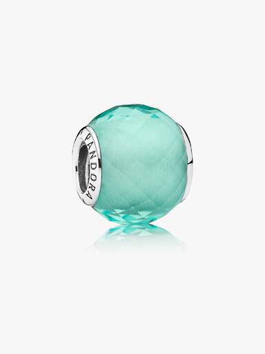 Abstract faceted silver charm with synthetic green quartz