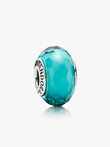Abstract faceted silver charm with teal murano glass