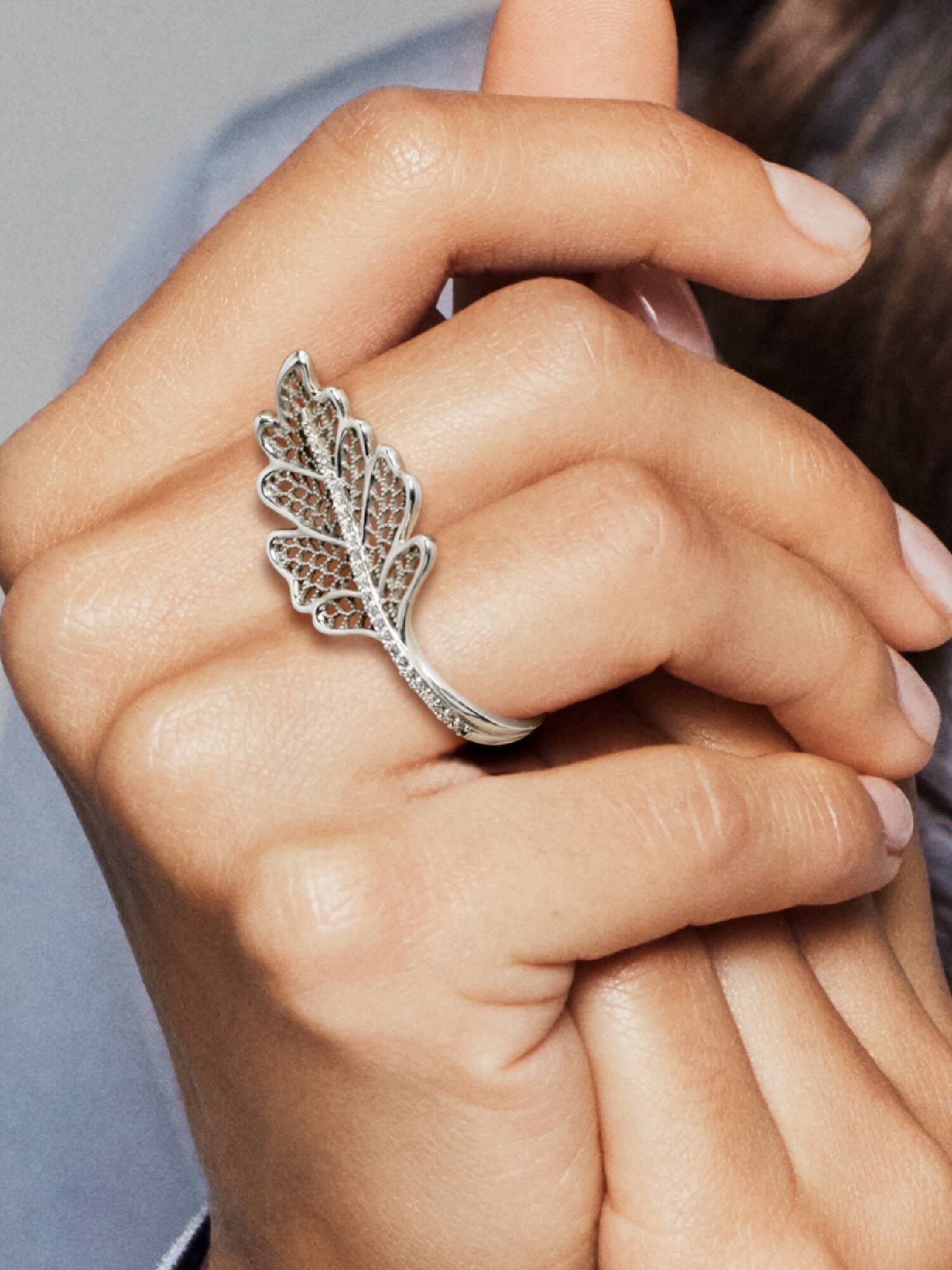 Double finger oak leaf sterling silver ring with clear cubic zirconia