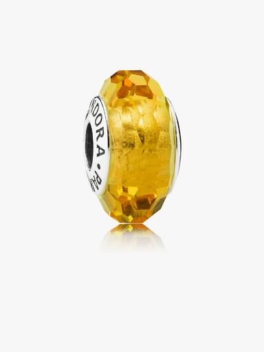 Abstract faceted silver charm with golden coloured Murano glass