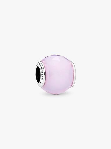 Abstract silver charm with faceted opalescent pink crystal