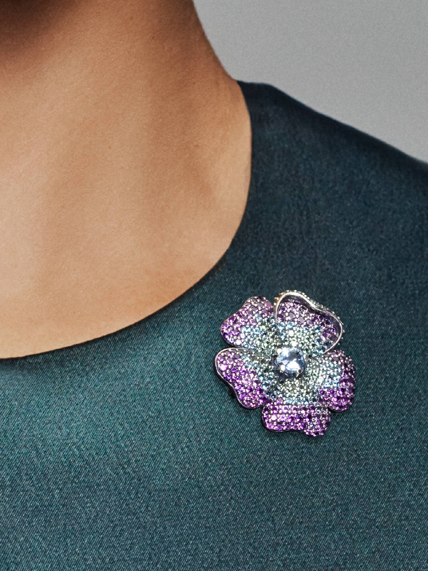 Floral silver pendant and brooch with royal purple, aqua blue and vivid green crystal