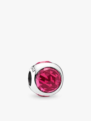 Silver charm with cerise crystal