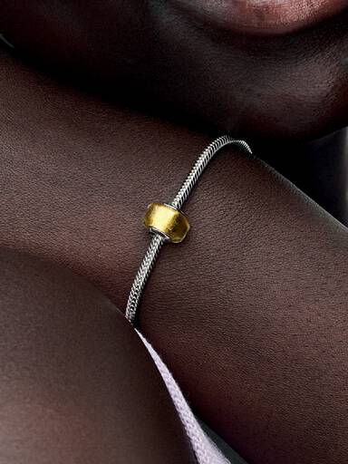 Sterling silver charm with transparent Murano glass and 24k gold foil