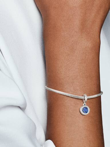 Circle and disc sterling silver dangle with clear cubic zirconia and stellar blue crystal