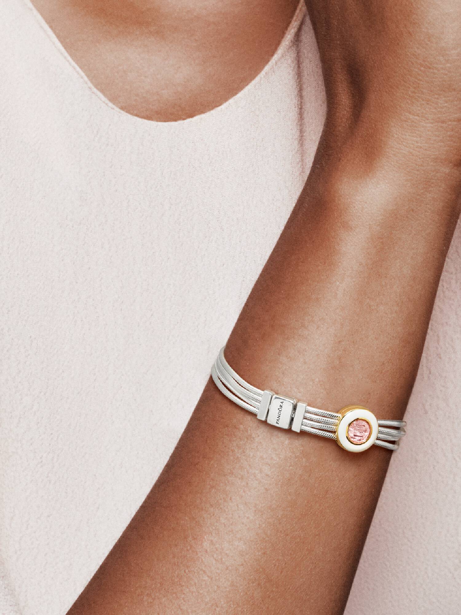 Pandora Reflexions round clip charm in Pandora Shine with orchid pink crystal and white enamel
