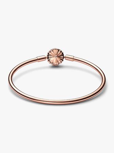 14k Rose gold-plated bangle with snowflake clasp and clear cubic zirconia