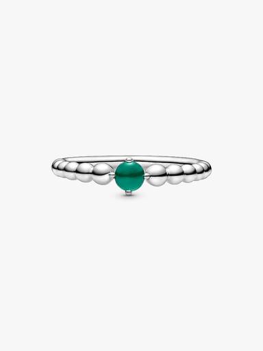 Sterling silver ring with treated rainforest green topaz