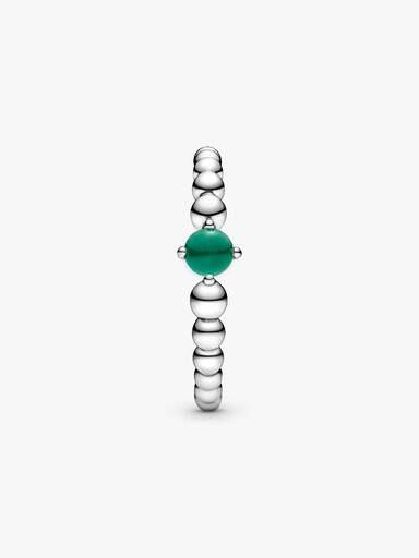 Sterling silver ring with treated rainforest green topaz