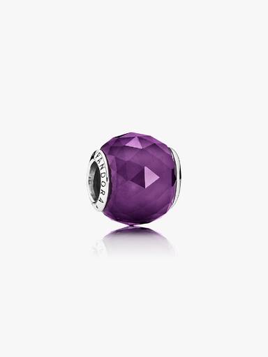 Abstract silver charm with faceted royal purple crystal