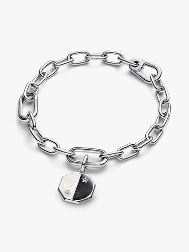 Yin and yang sterling silver medallion with clear cubic zirconia, glittery black and white enamel