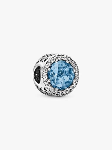 Abstract silver charm with sky blue crystal and clear cubic zirconia