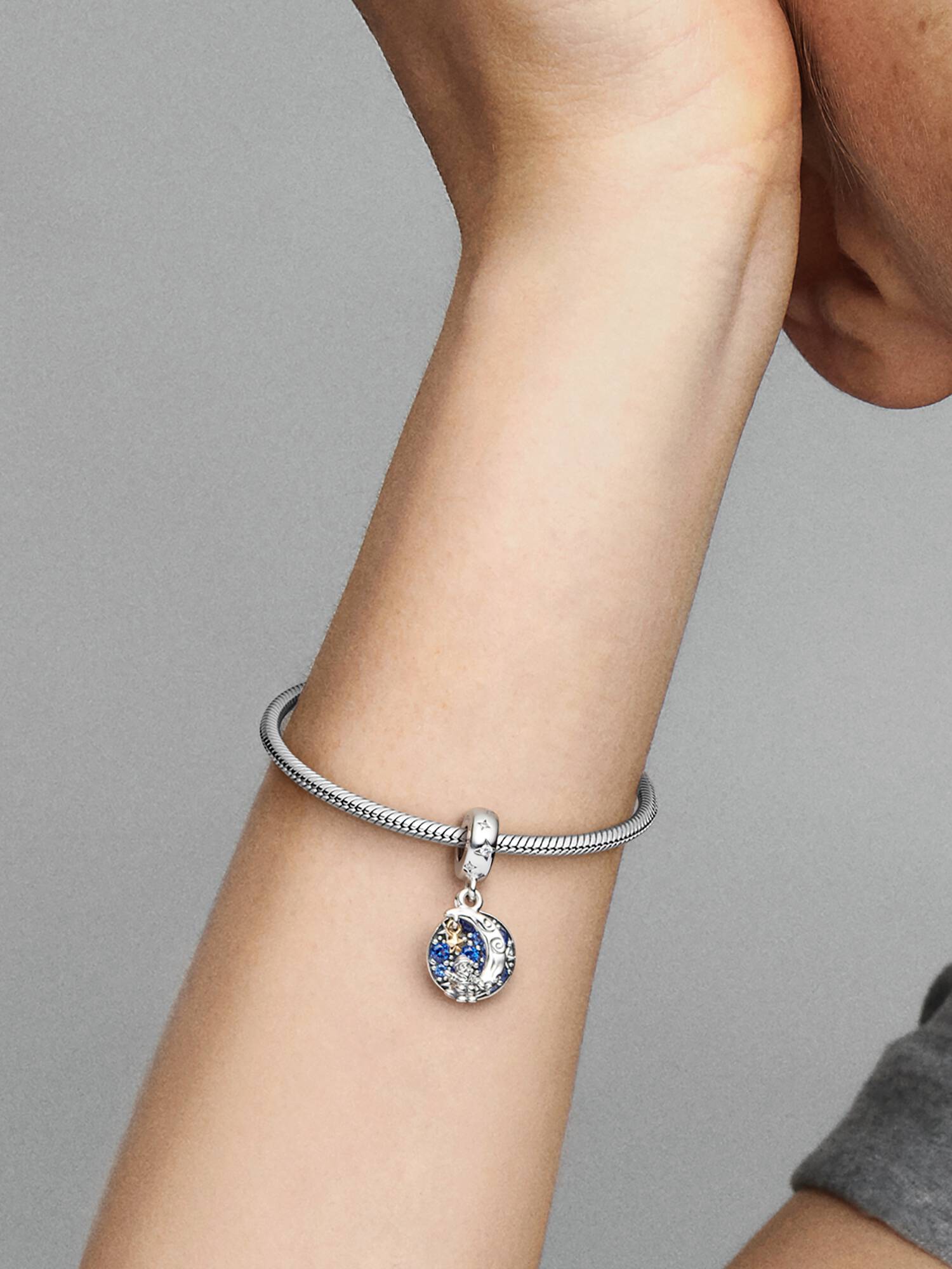 Santa on moon sterling silver and 14k gold-plated dangle with stellar blue crystal and clear cubic zirconia